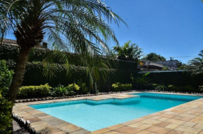 Casa Guarujá · Conforto e diversão a um quarteirão da areia!